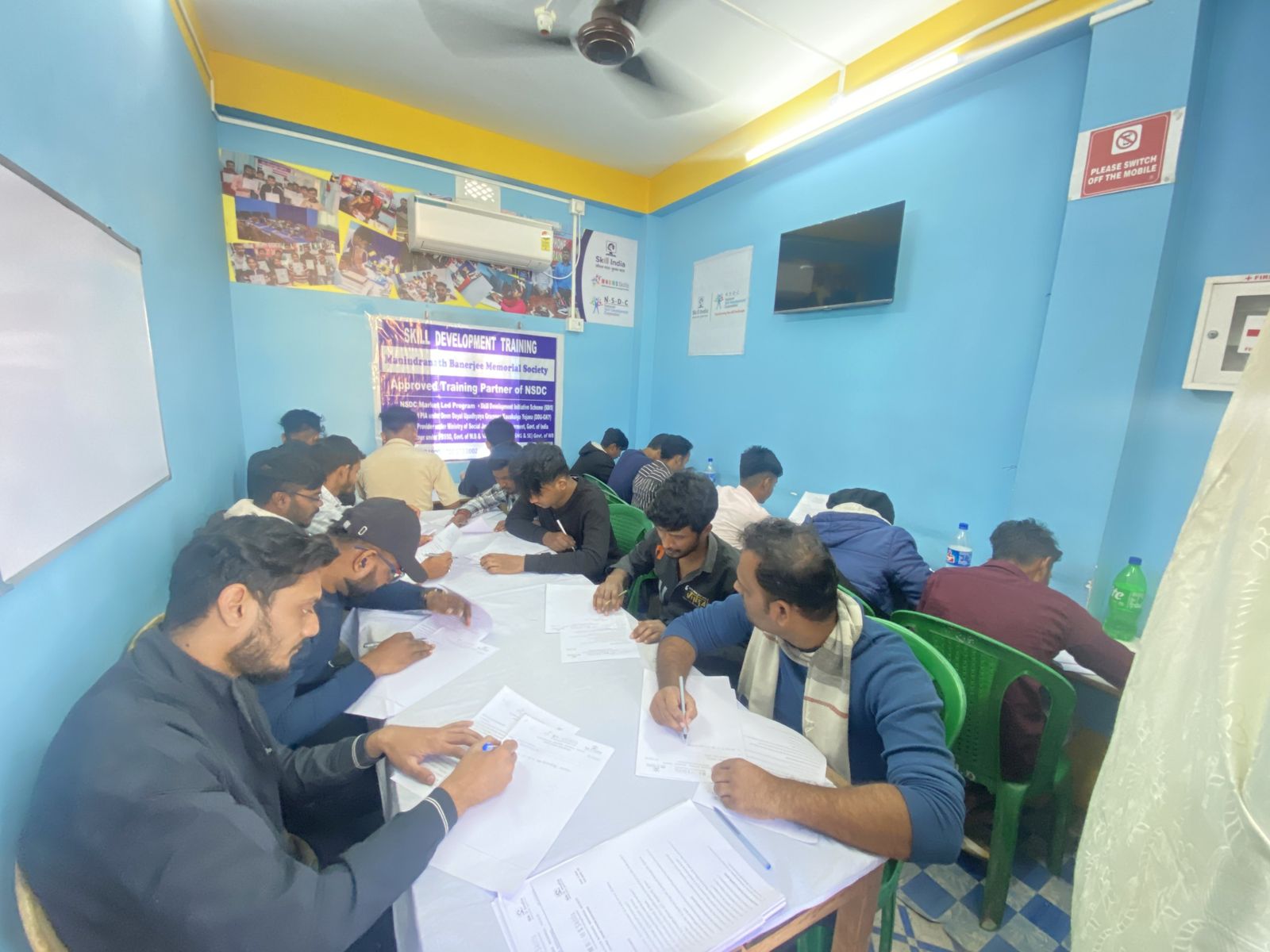 Students writing an assessment